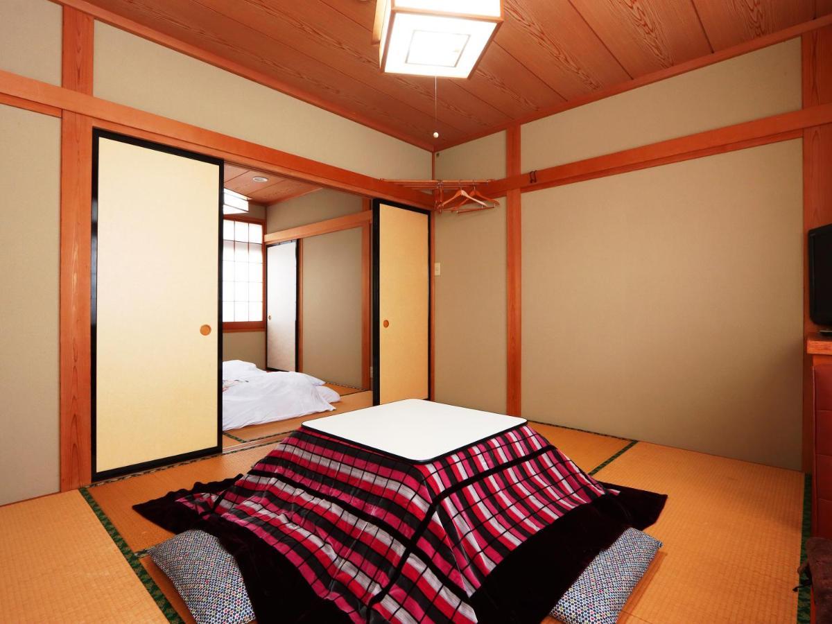Minshuku Kojima Hotel Nozawaonsen Bagian luar foto