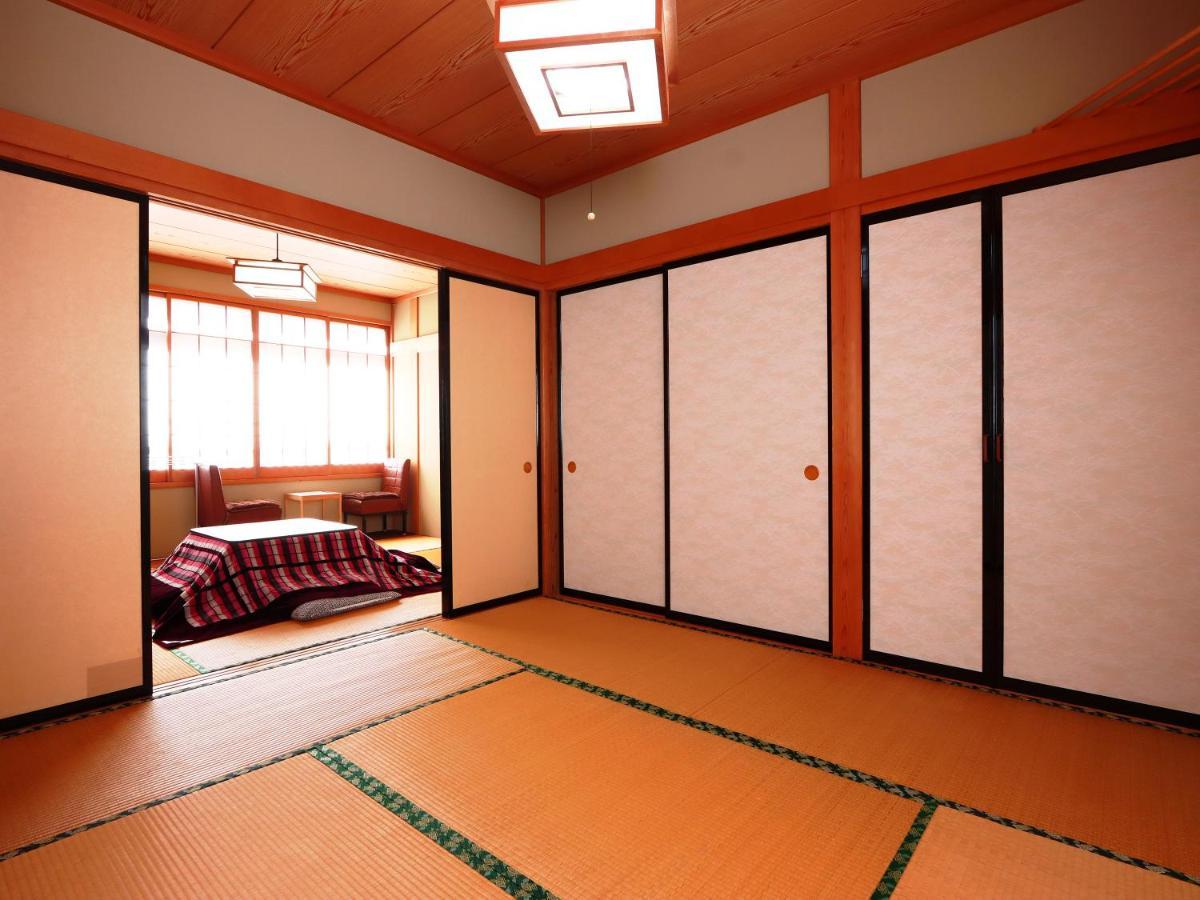 Minshuku Kojima Hotel Nozawaonsen Bagian luar foto